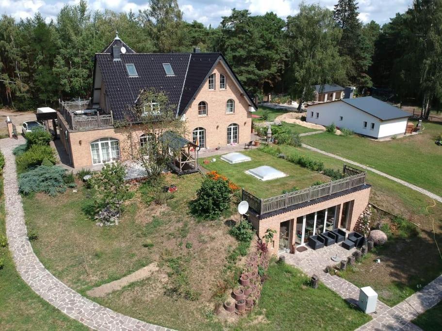 Vakantiehuis Haus Wilma Gruene Idylle Im Wald Direkt Am Wendisch Rietz